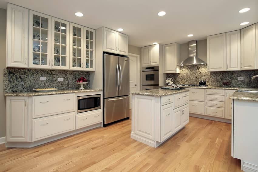 white kitchen cabinets with granite countertops