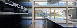 sleek-black-modern-kitchen-with-view