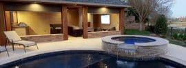 swimming-pool-with-cabana-with-motorized-shades-fireplace