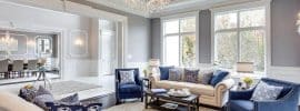 traditional-luxury-living-room-with-tray-ceiling-and-glass-chandelier