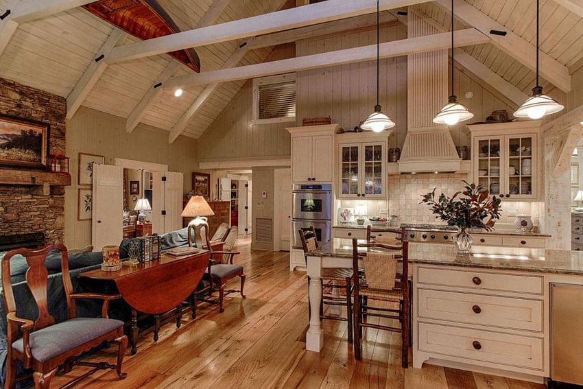 white country kitchen with hickory wood floors rustic island and cathedral ceiling