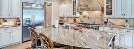 luxury-kitchen-with-island-and-lennon-granite-slab-countertop