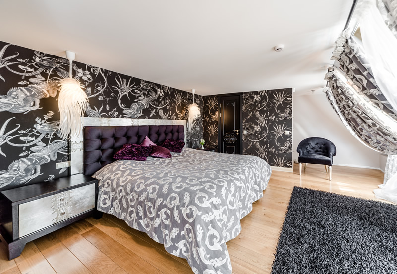 Modern bedroom design with black white wallpaper