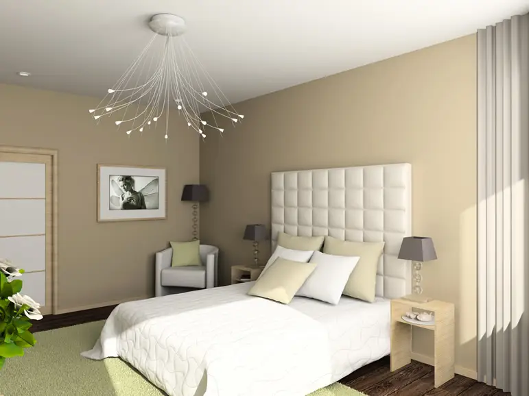 Bedroom with white bedboard, grey lamp and hanging light