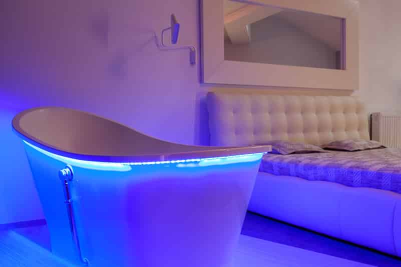 Neon bath in modern purple white-bedroom