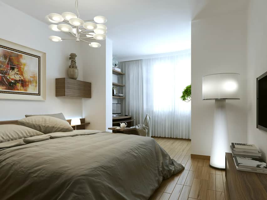 Bedroom with engineered maple floors and shelf