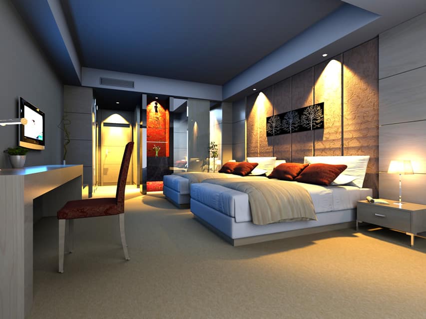 Room with twin beds, dark brown pillows and vertical panel walls