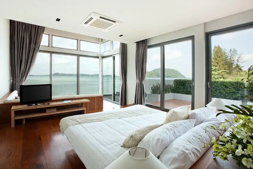 Bedroom with wrap around ocean view
