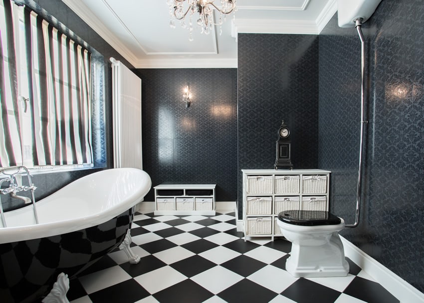 Black & white bathroom with Victoria double slipper claw foot bath tub
