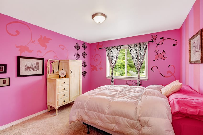 Hot pink room with soft beige carpets and bedding with flower wall stencils