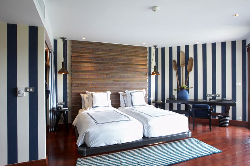 Contemporary bedroom zebra stripes hardwood