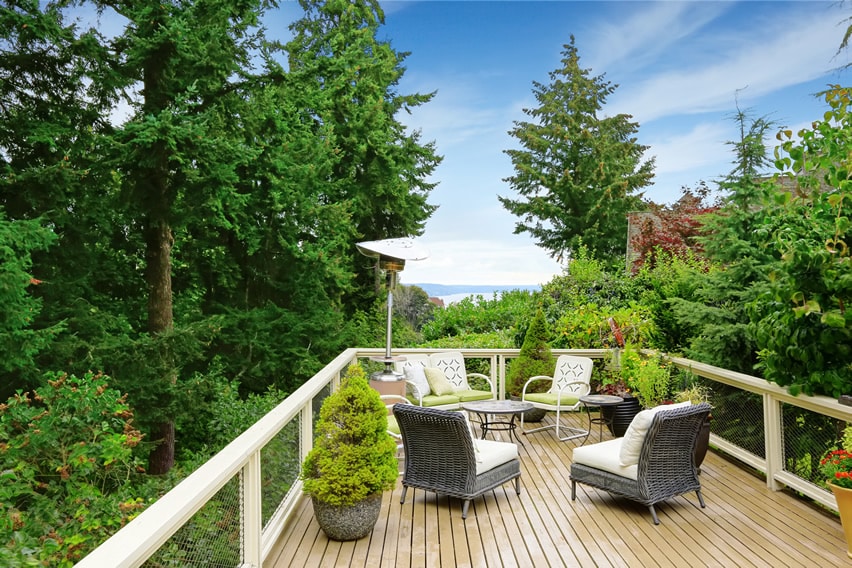 Deck with sitting area and view or trees