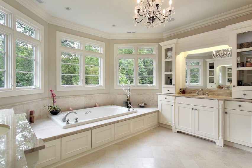 Bathroom with wraparound windows, granite splashboard and glass chandelier