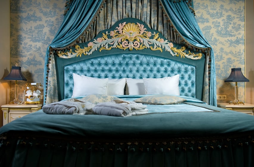 Elegant bedroom with aqua bedding