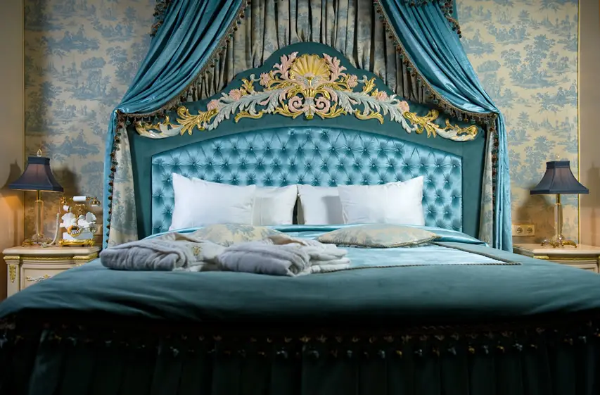 Elegant bedroom with aqua bedding