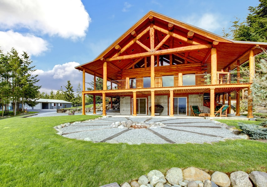 Log type home with gravel fire pit