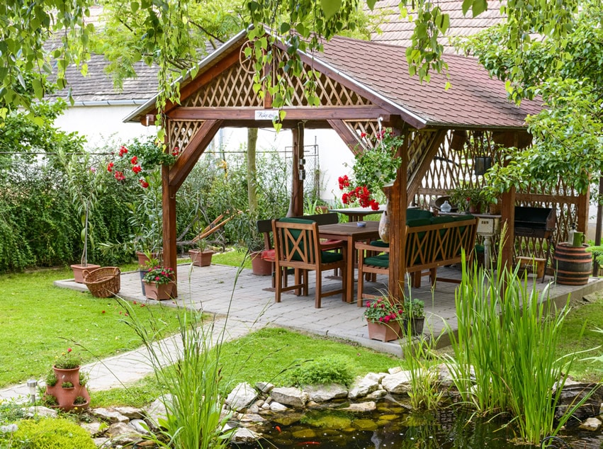 Gazebo with outdoor dining area and patio