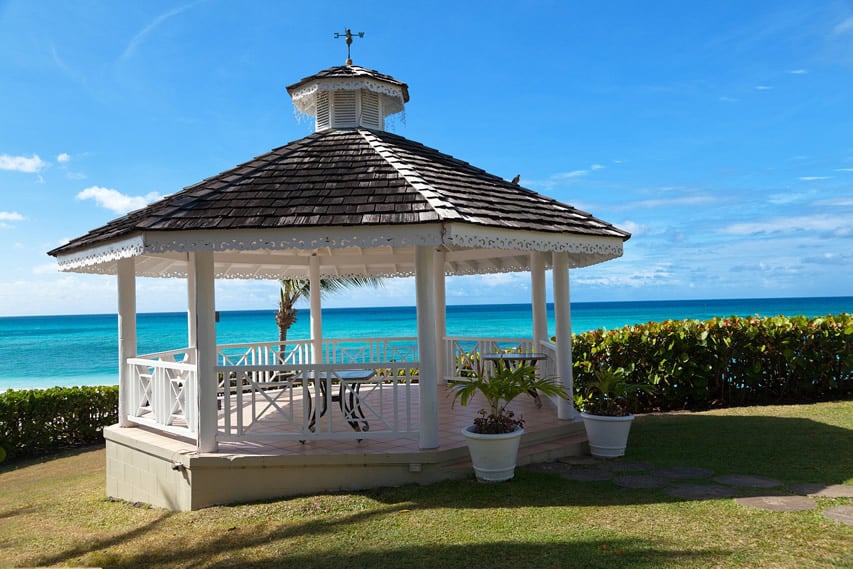 Gazebo with concrete base and white framing