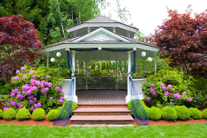 Large gazebo with railing and redwood floors