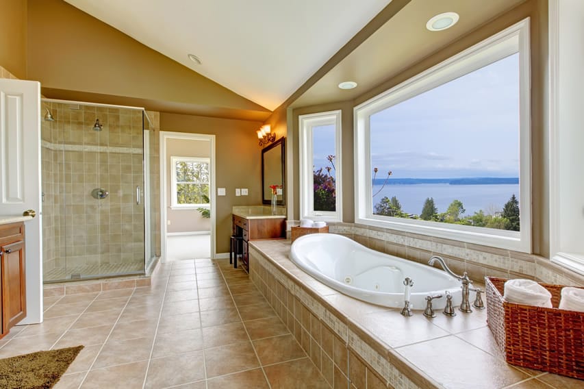 Spacious bathroom with amazing views, using budget-friendly materials