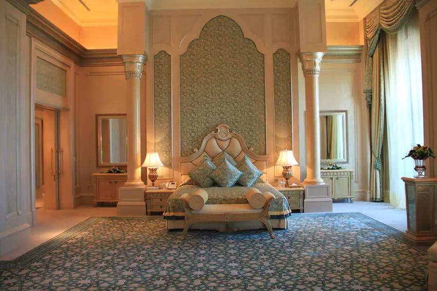 Large master bedroom with majestic style and pillars