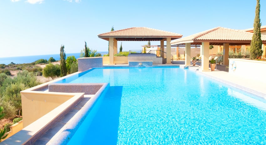 Large swimming pool with ocean view