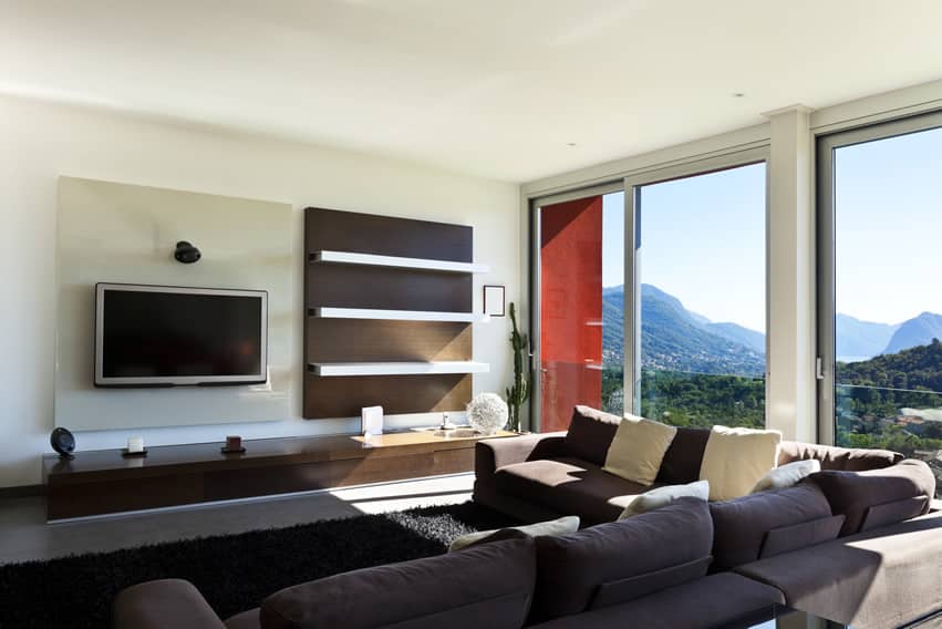 Living room interior of a modern design home with mountain window view