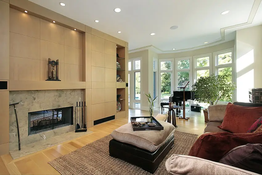 Recess lighted and custom marble fireplace