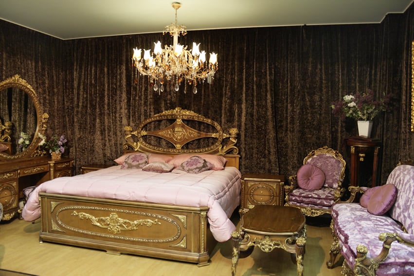 Luxury bedroom with curtain wall gold trim crystal chandelier