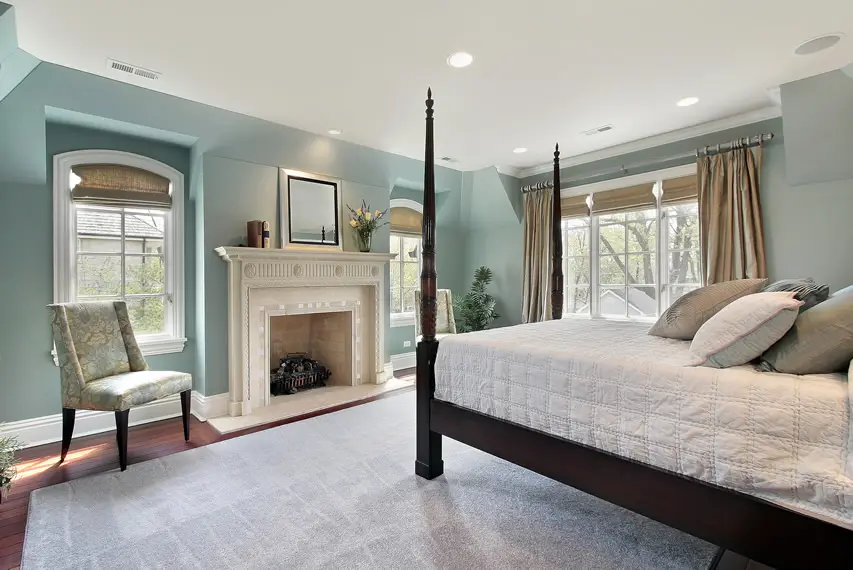 Master bedroom in new home with large post bed