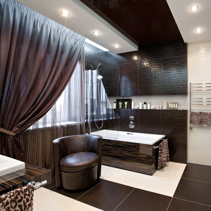 Modern bathroom design uses simple color palette consisting of white and shades of brown