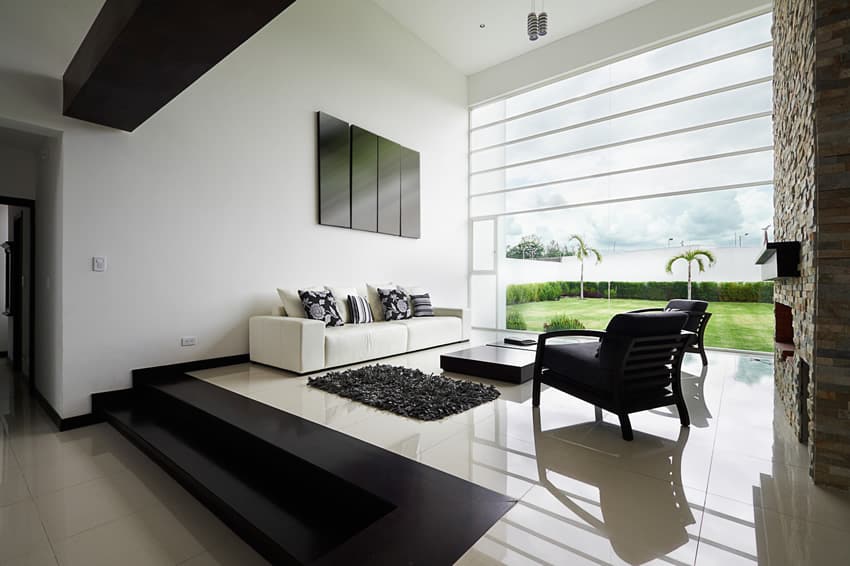 Modern design living room with large back yard window