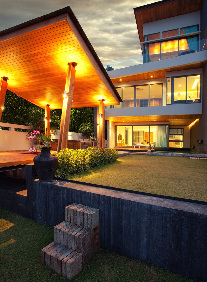 Modern outdoor canopy structure with horizontal teak wood slats