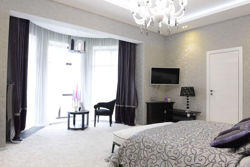 Modern themed bedroom purple white design