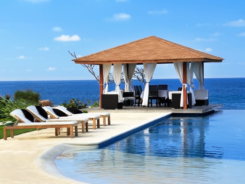 Oceanfront gazebo beside infinity pool