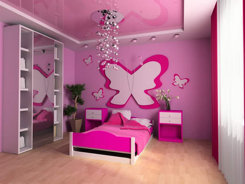 Butterfly themed bedroom with hanging decor and pink design