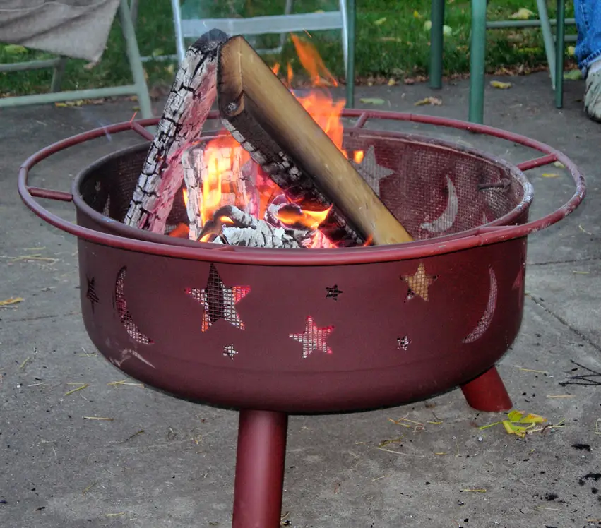 Portable metal fire pit with star design