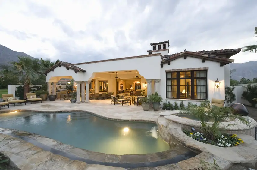 Deer creek pool with rounded steps and hot tub view 