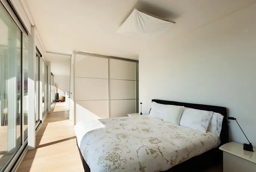 Bedroom with maple hardwood floor and plaform bed