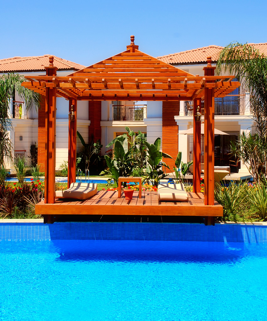 Swimming pool and gazebo with lounge chairs