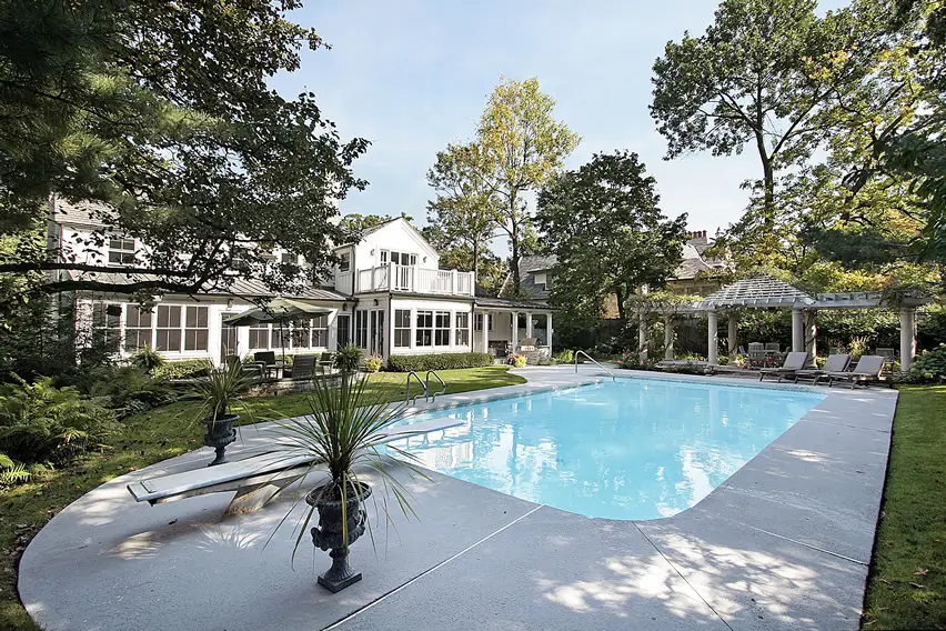 Soft edged rectangle pool with inlaid poured concrete