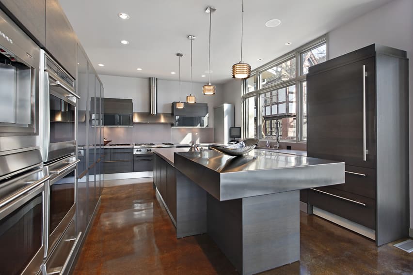 Kitchen design with grey cabinets and stainless grey countertops