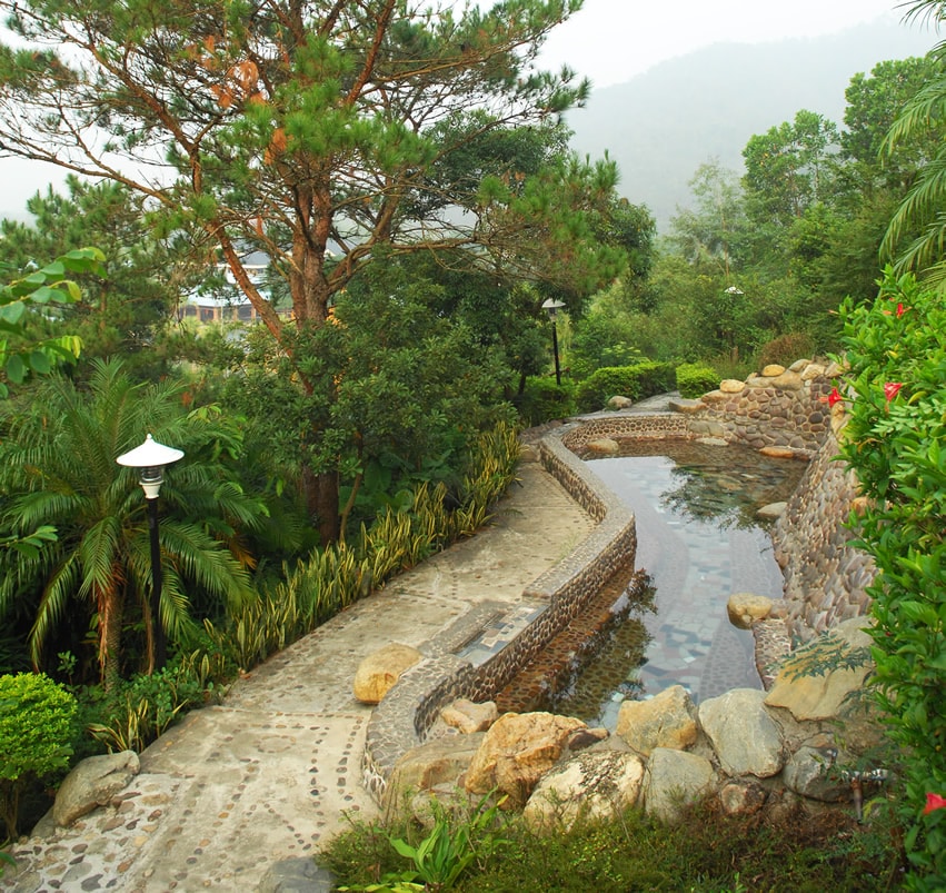 Stone pool water feature and garden path