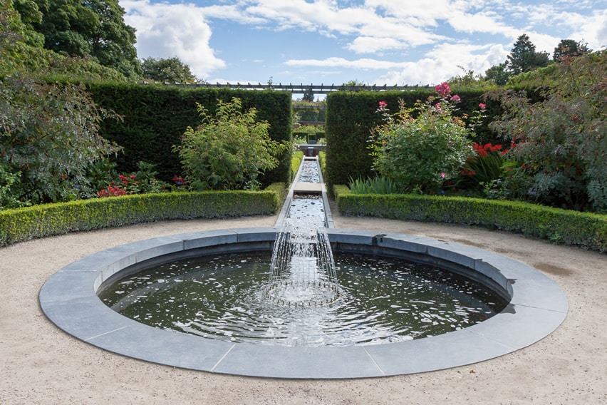 Water feature stream and fountain in gardens