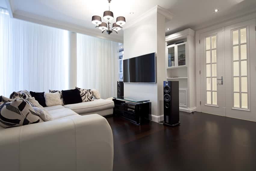 White living room with sound system