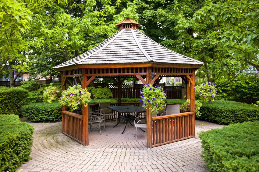 Wood garden gazebo on brick pavers