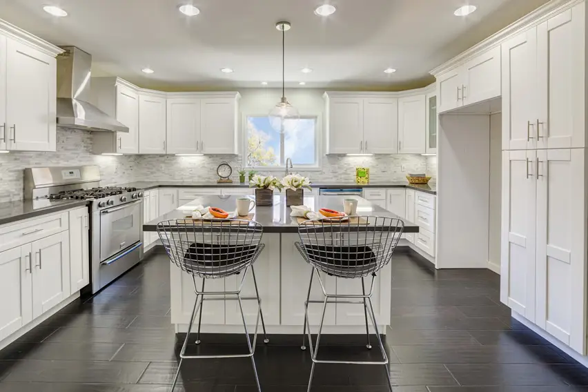 Bright white upscale kitchen with eat-in island