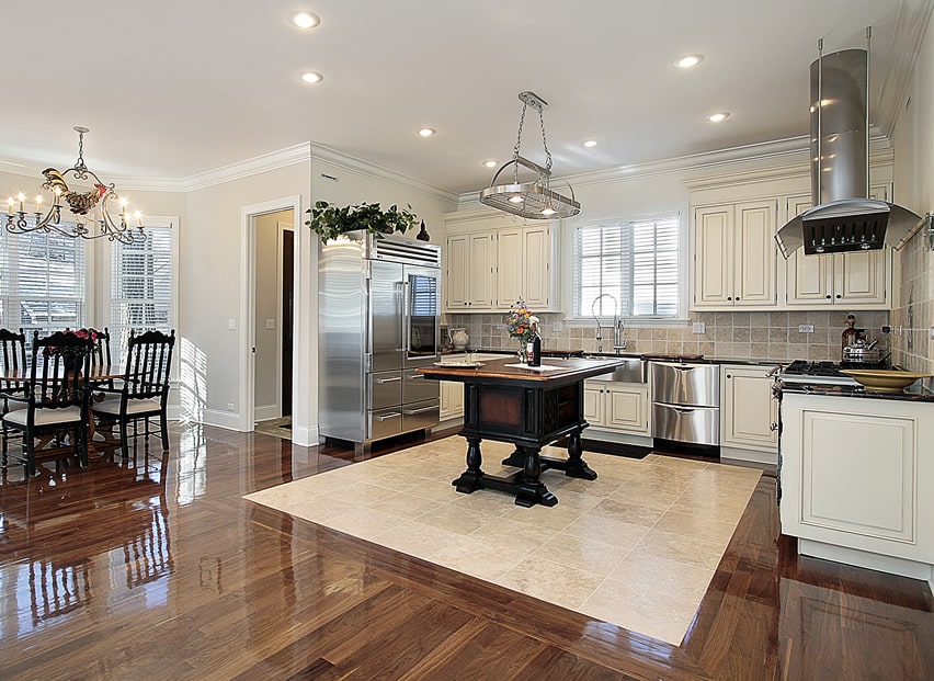 Cabinets in all white finish matched with small counter in black finish