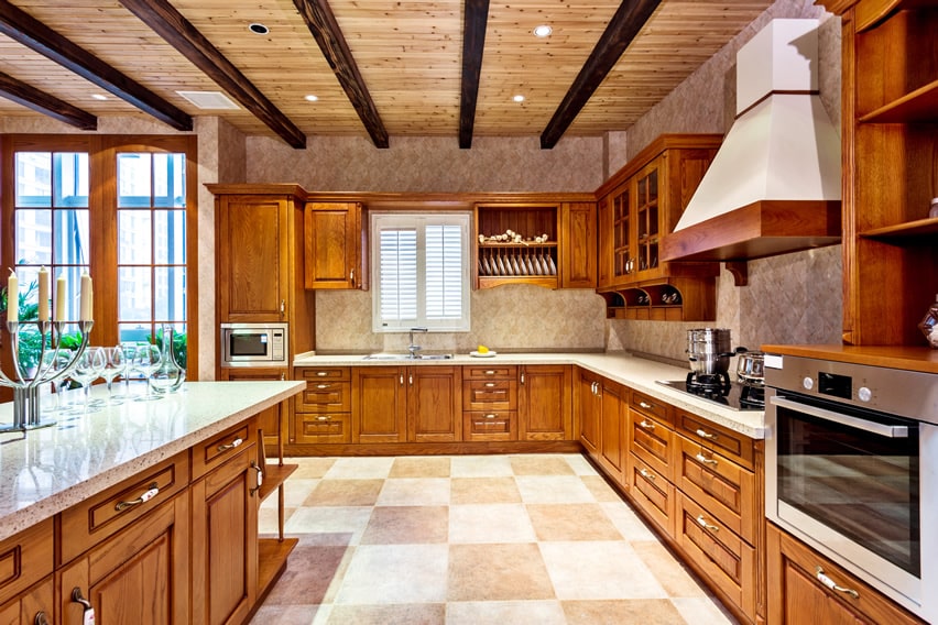 Large upscale kitchen with exposed beams