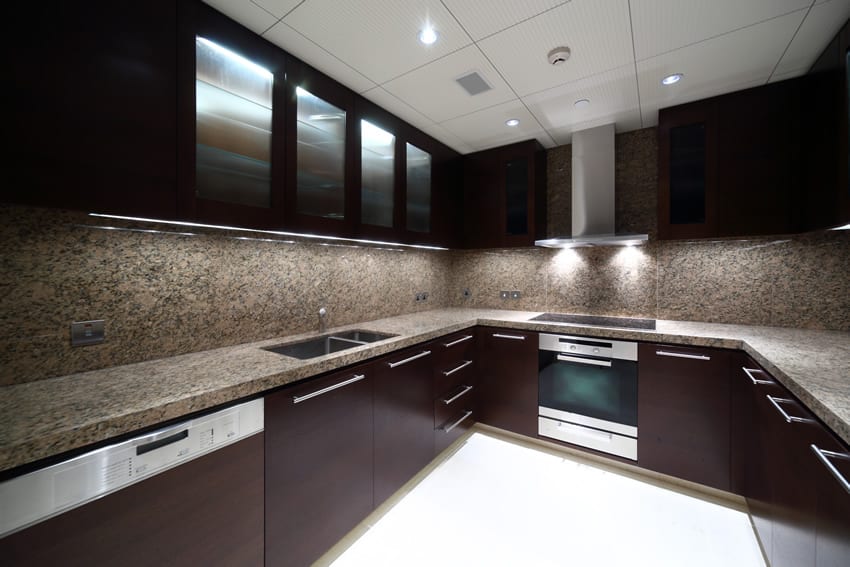 Modern kitchen design with dark cabinets
